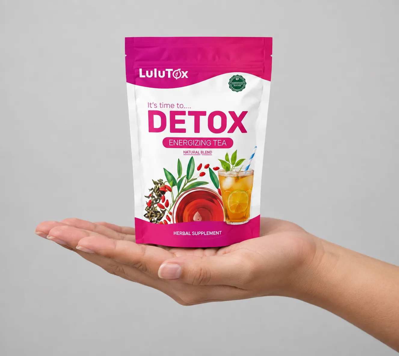 Lulutox Detox Tea — the package held in a hand