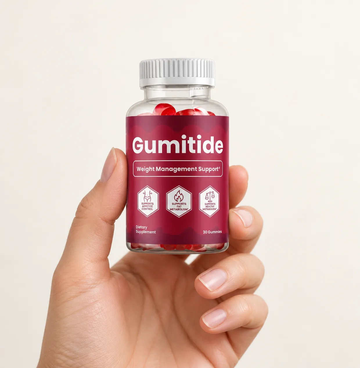 Gumitide — the package held in a hand